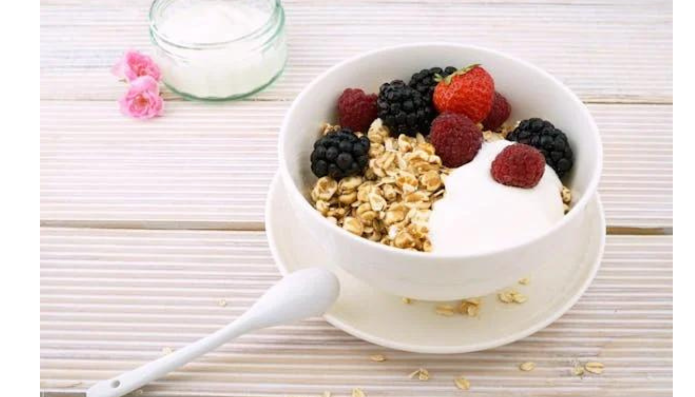 Top Greek yogurt with fresh fruit, nuts, or seeds can replace protein cookies.